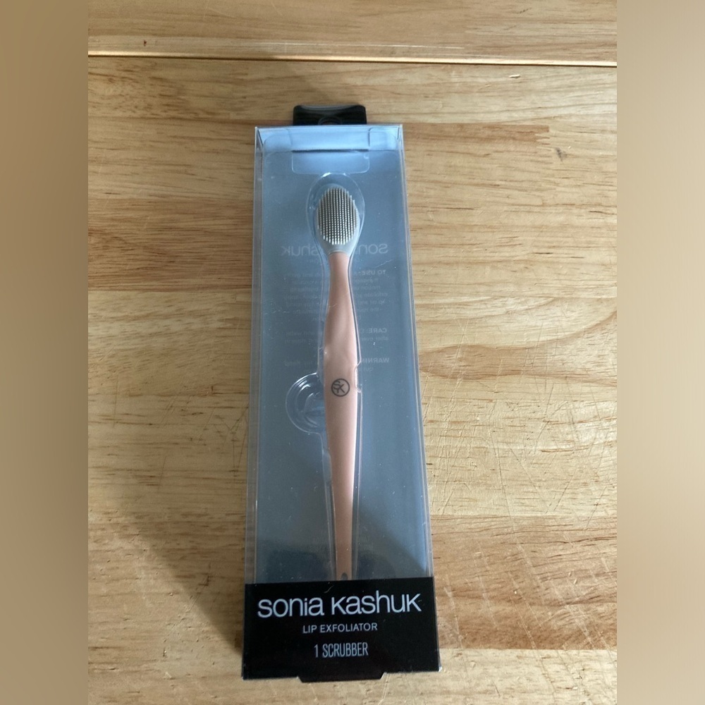 Sonia Kashuk lip exfoliator. Pink in color. New in box